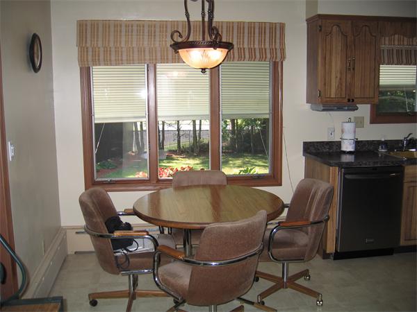 350 Granby Road Chicopee, MA 01013 - Photo 8 of 28 a living room with furniture and a chandelier