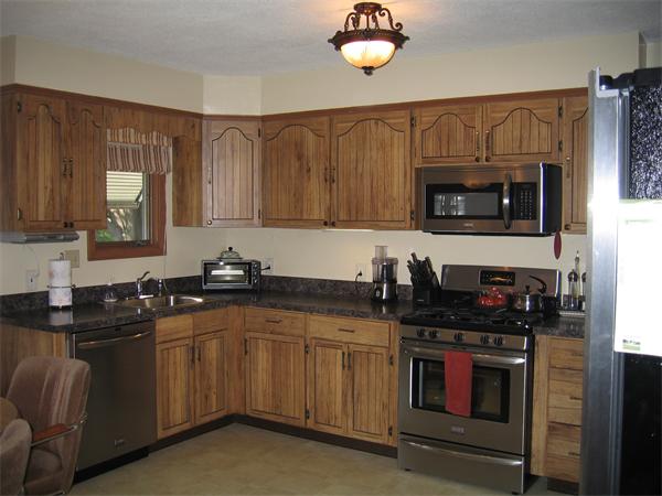 350 Granby Road Chicopee, MA 01013 - Photo 9 of 28 a kitchen with a sink stove and microwave