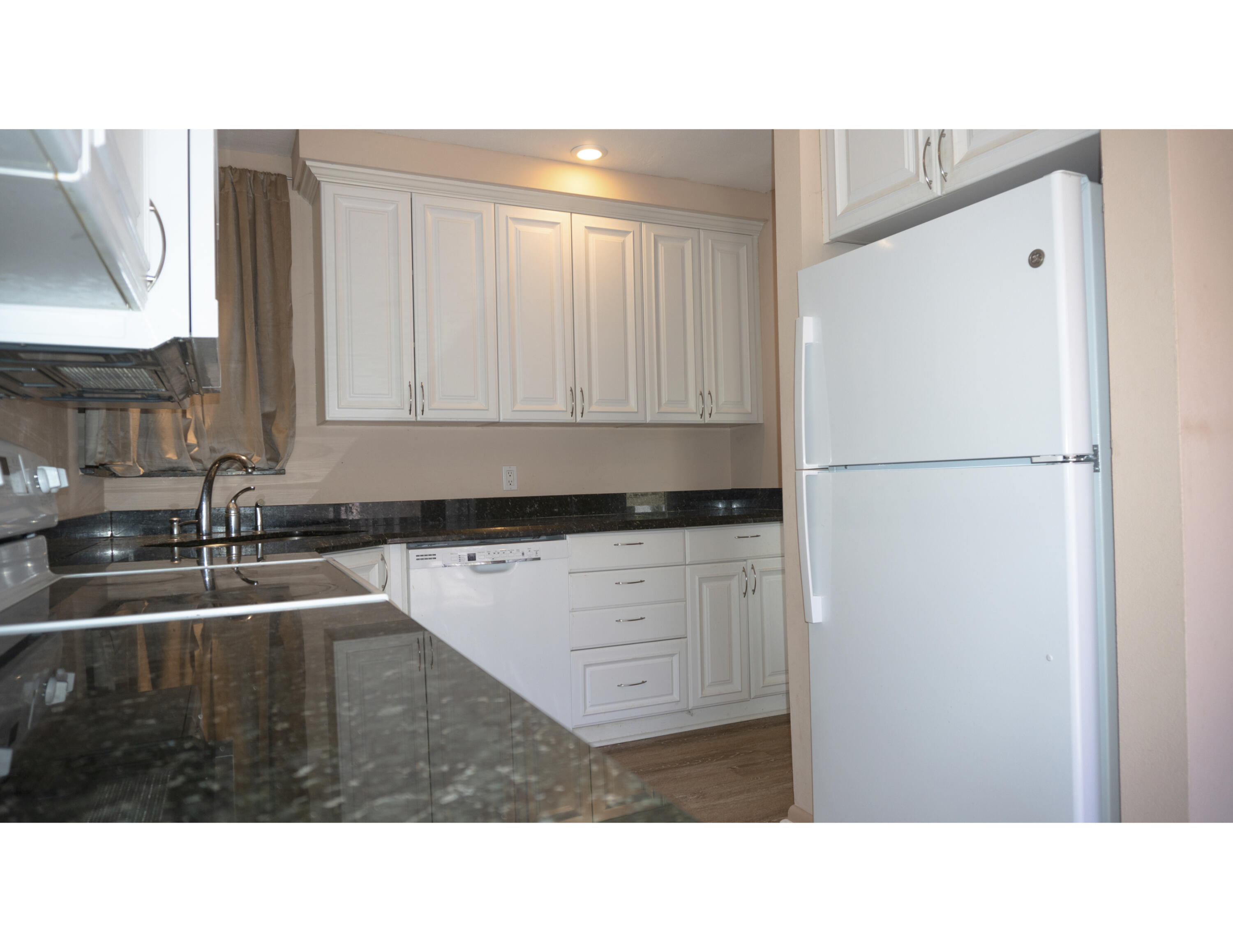 6335 Riverwalk Lane, Unit 7 Jupiter, FL 33458 - Photo 6 of 25 KITCHEN 01