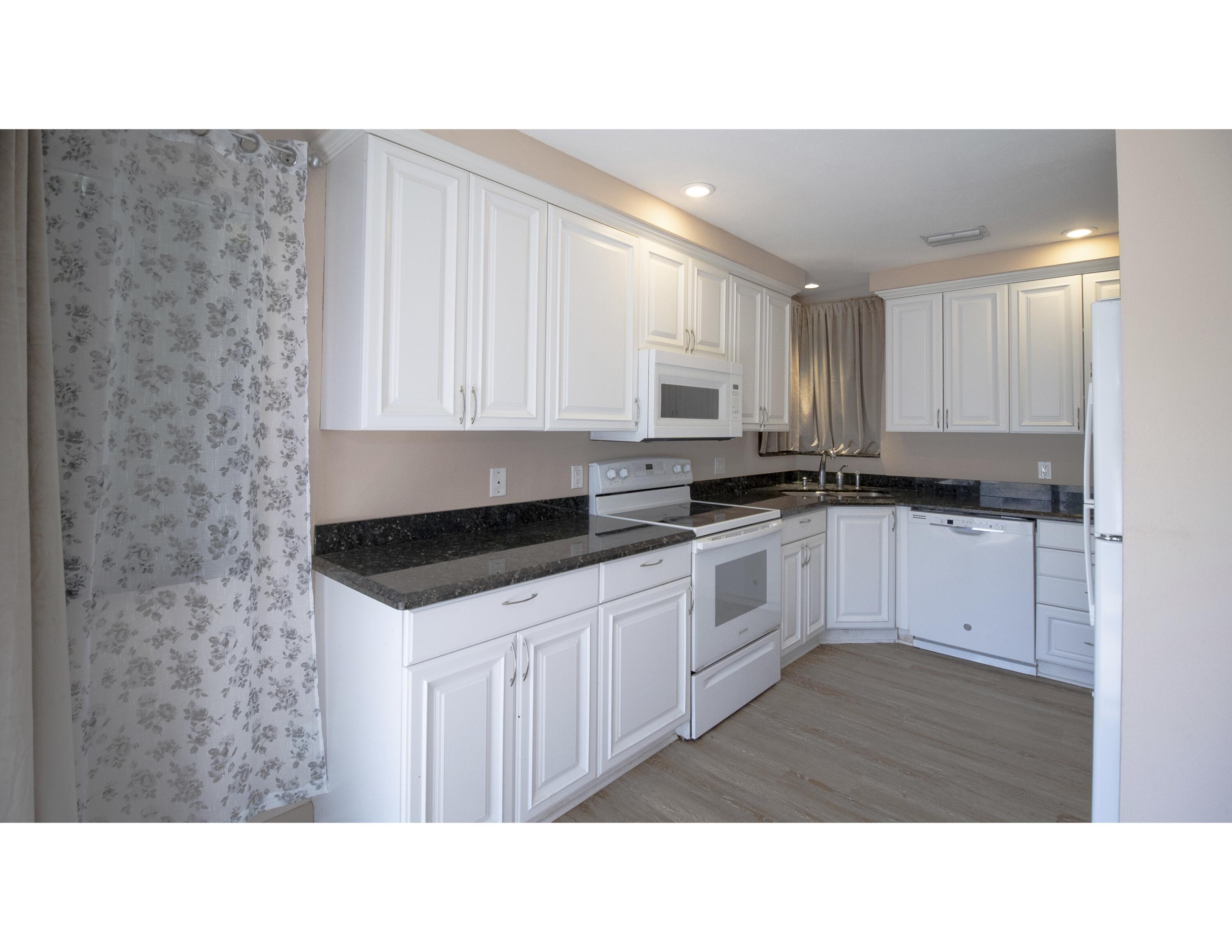 6335 Riverwalk Lane, Unit 7 Jupiter, FL 33458 - Photo 9 of 25 KITCHEN 4