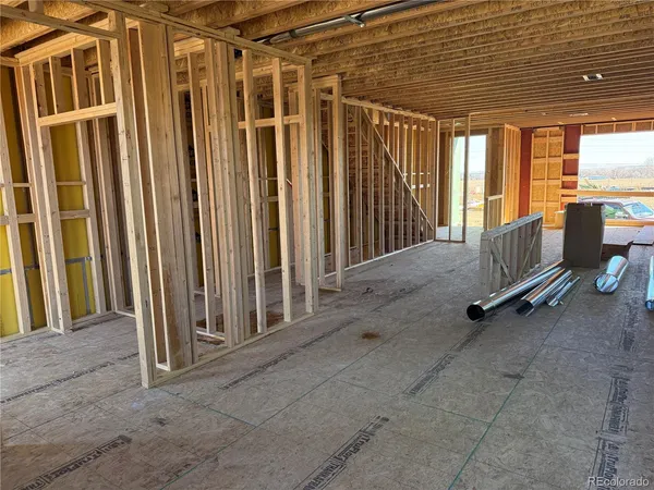 a view of a porch with wooden floor