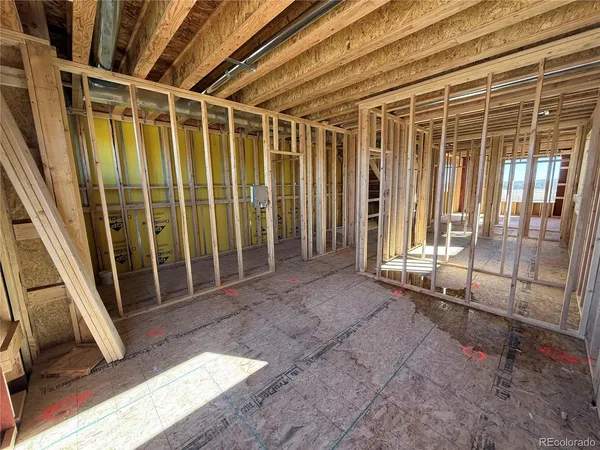 a view of an empty room with glass door