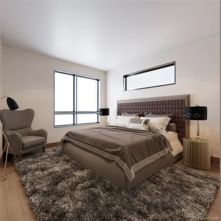 a bedroom with bed and window