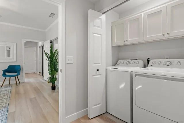 a view of kitchen with furniture and wooden floor