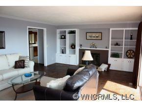 1695 Hogback Mountain Road Tryon, NC 28782 - Photo 3 of 12 a living room with furniture and wooden floor
