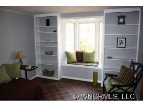 1695 Hogback Mountain Road Tryon, NC 28782 - Photo 8 of 12 a living room with furniture rug and window
