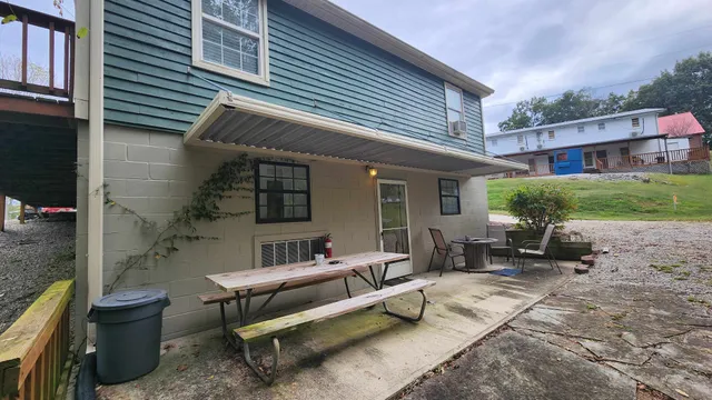 an aerial view of residential houses with outdoor space