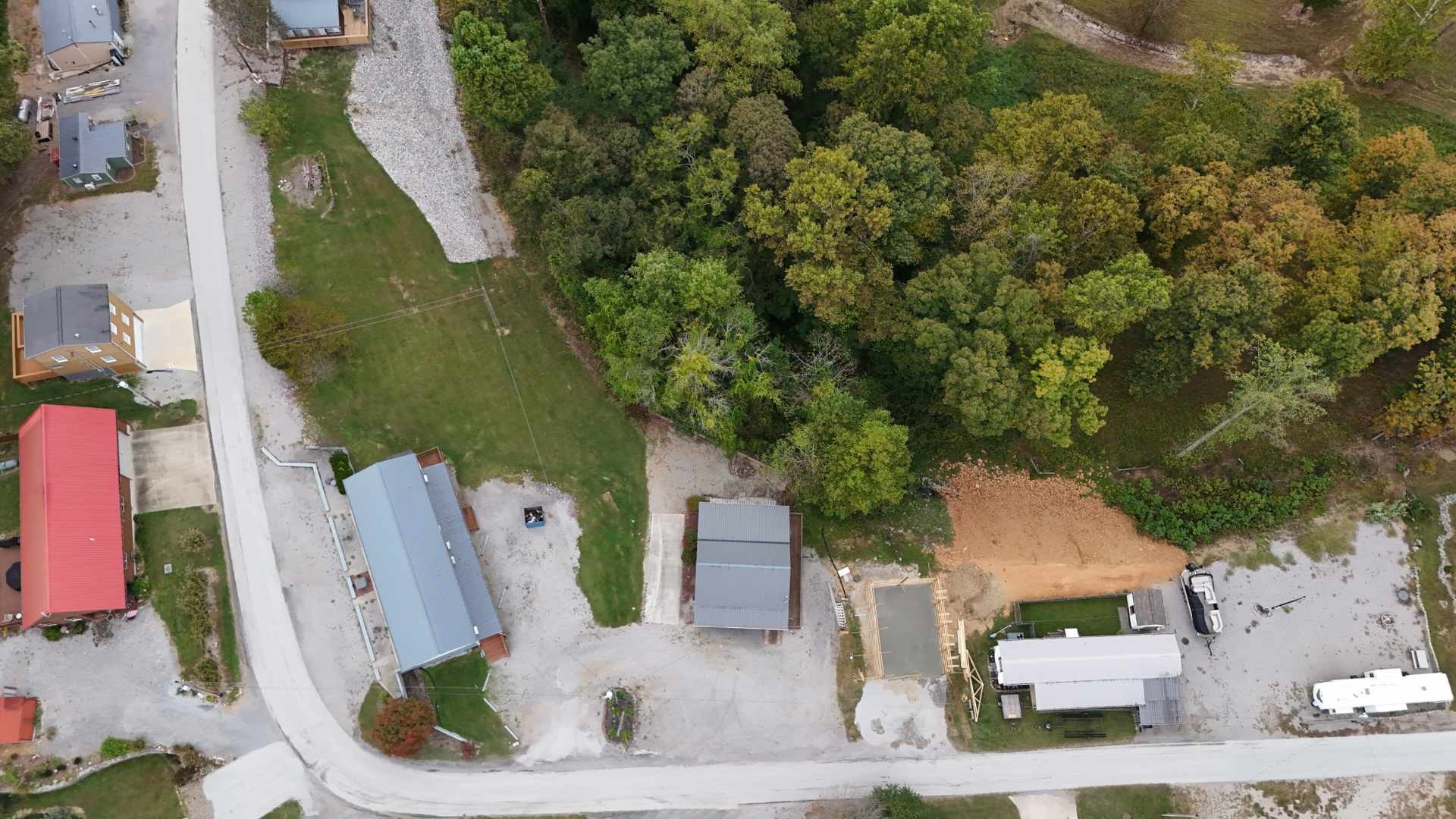 228 Bill Hunter Road Celina, TN 38551 - Photo 46 of 57 an aerial view of a house with a yard