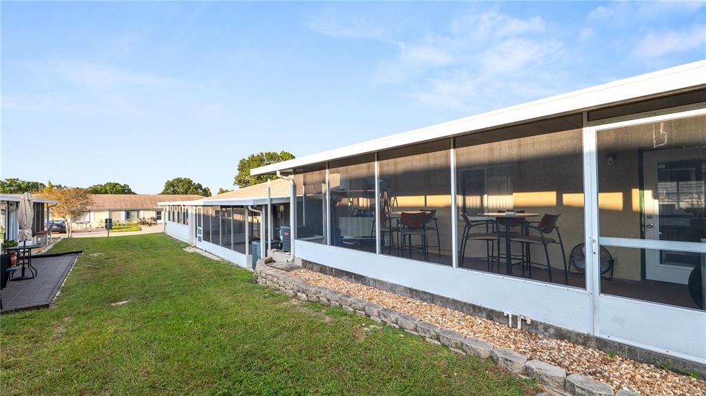 628 Ridge Terrace Winter Haven, FL 33881 - Photo 28 of 44 a view of a house with a yard and sitting area