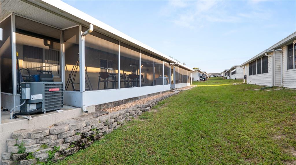 628 Ridge Terrace Winter Haven, FL 33881 - Photo 29 of 44 a view of an house with backyard porch and patio