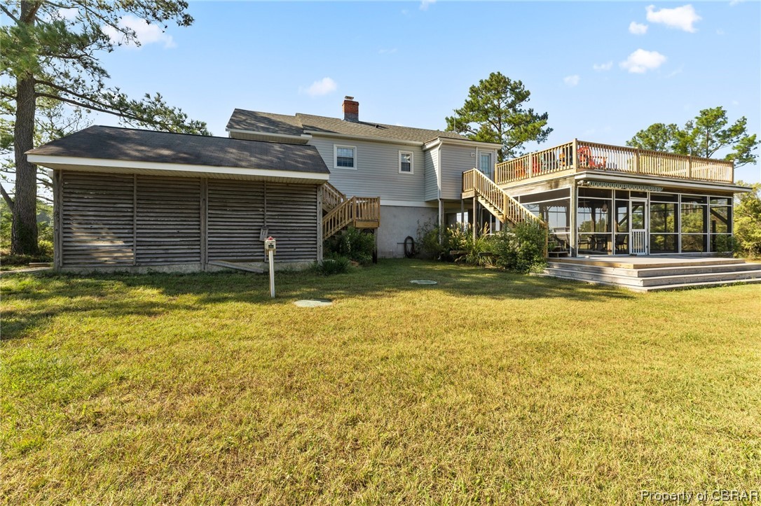2218 Mill Creek Road Wake, VA 23176 - Photo 40 of 41 Rear view of house featuring a lawn and a deck