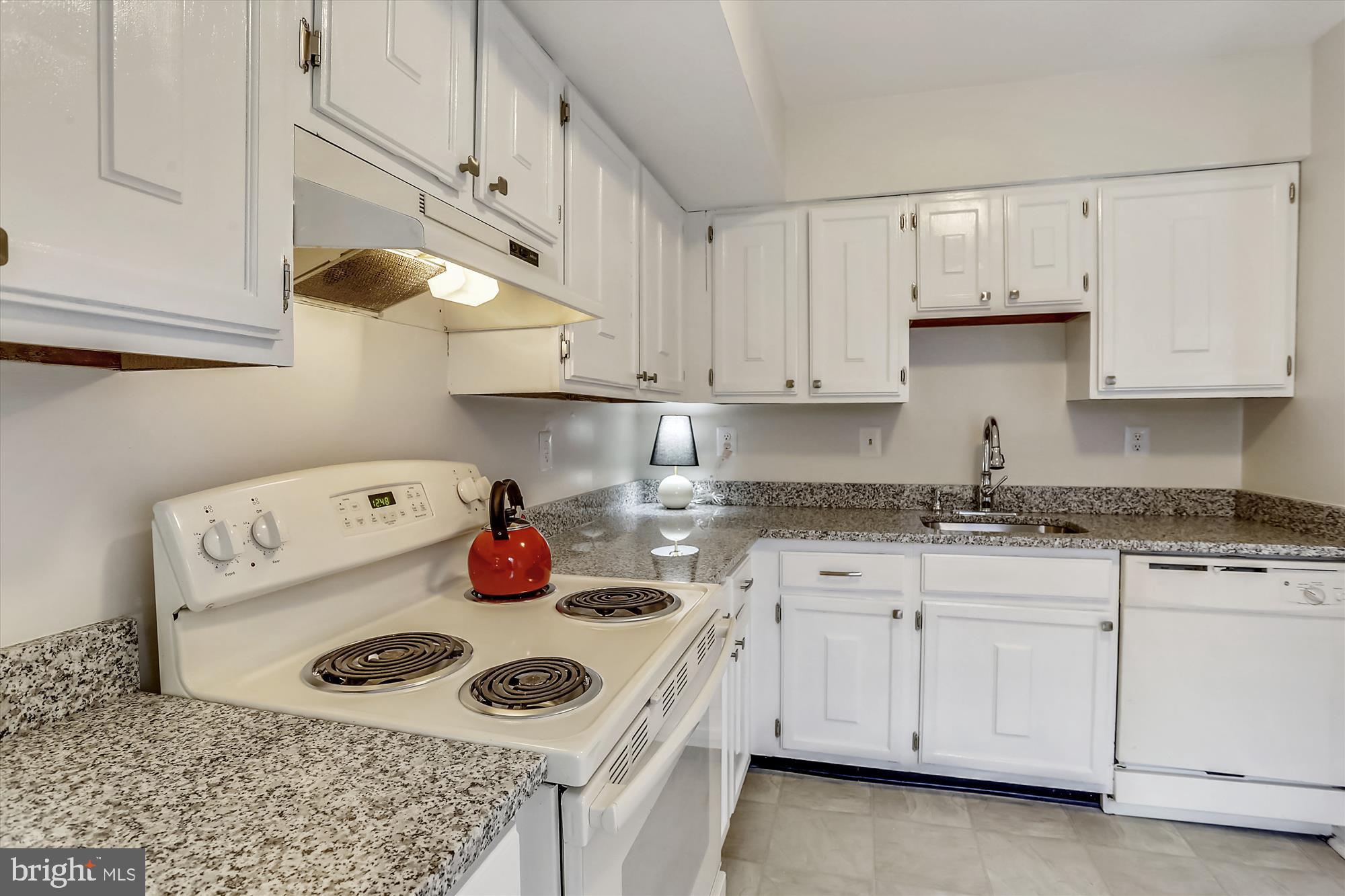 2014 Flowering Tree Terrace Silver Spring, MD 20902 - Photo 6 of 33 Bright White Kitchen with New Granite Counters