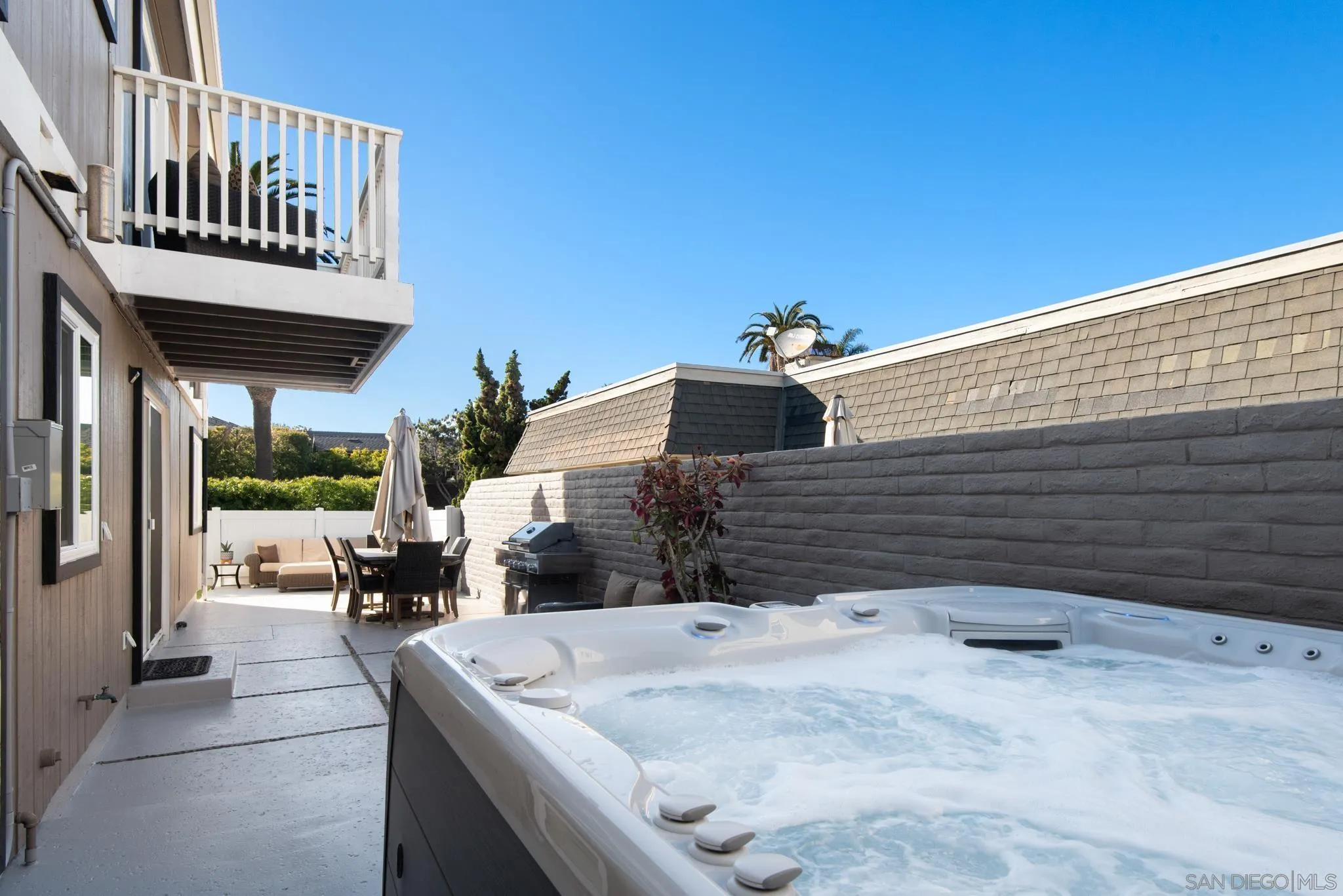1933 Coast Boulevard Del Mar, CA 92014 - Photo 17 of 47 a balcony with table and chairs
