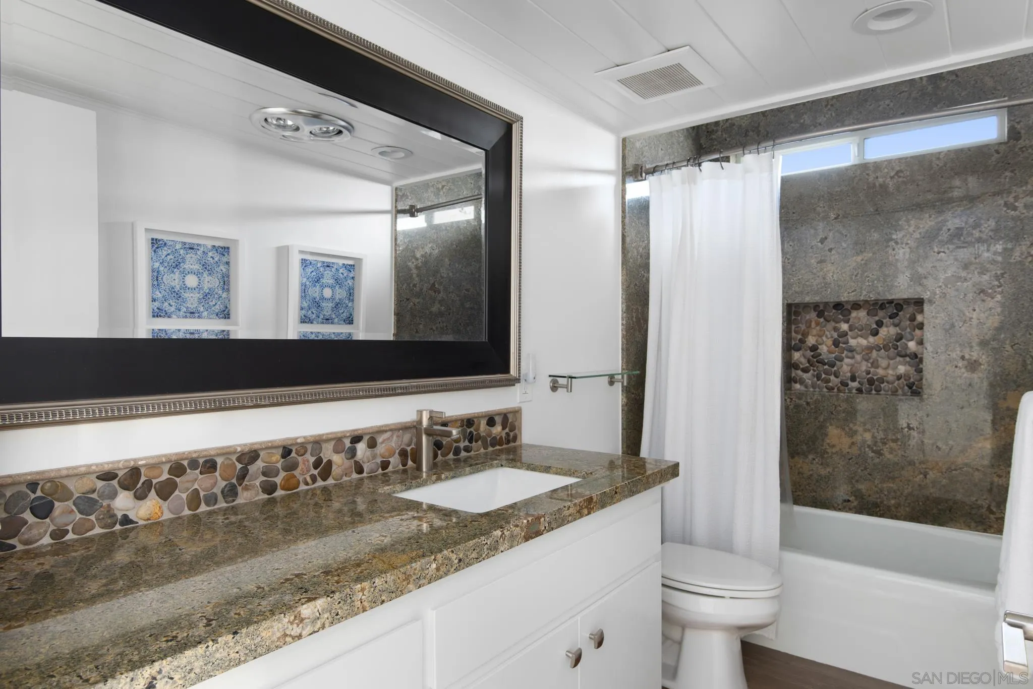 1933 Coast Boulevard Del Mar, CA 92014 - Photo 34 of 47 a bathroom with a granite countertop sink toilet and shower