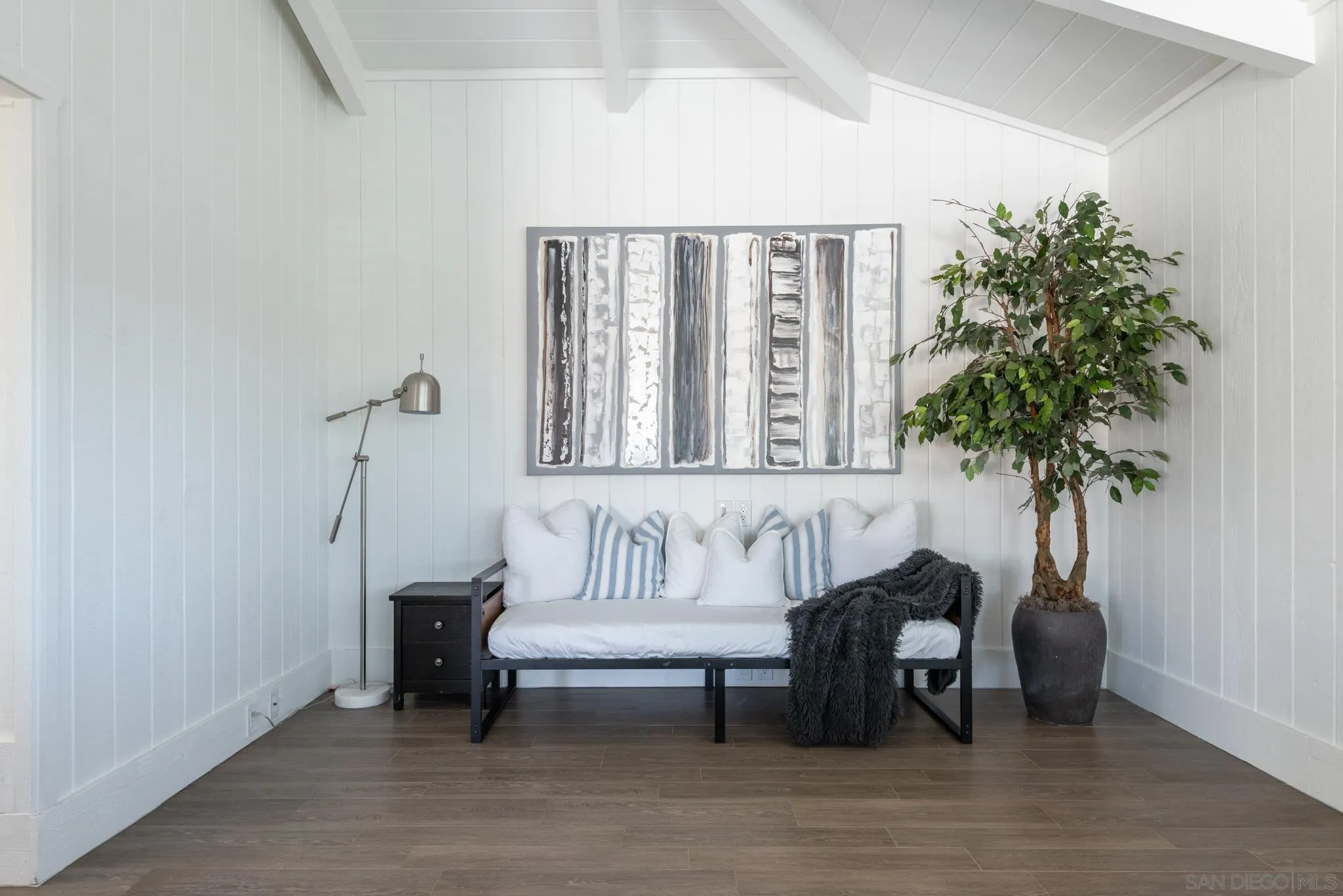 1933 Coast Boulevard Del Mar, CA 92014 - Photo 35 of 47 a living room with furniture and a potted plant