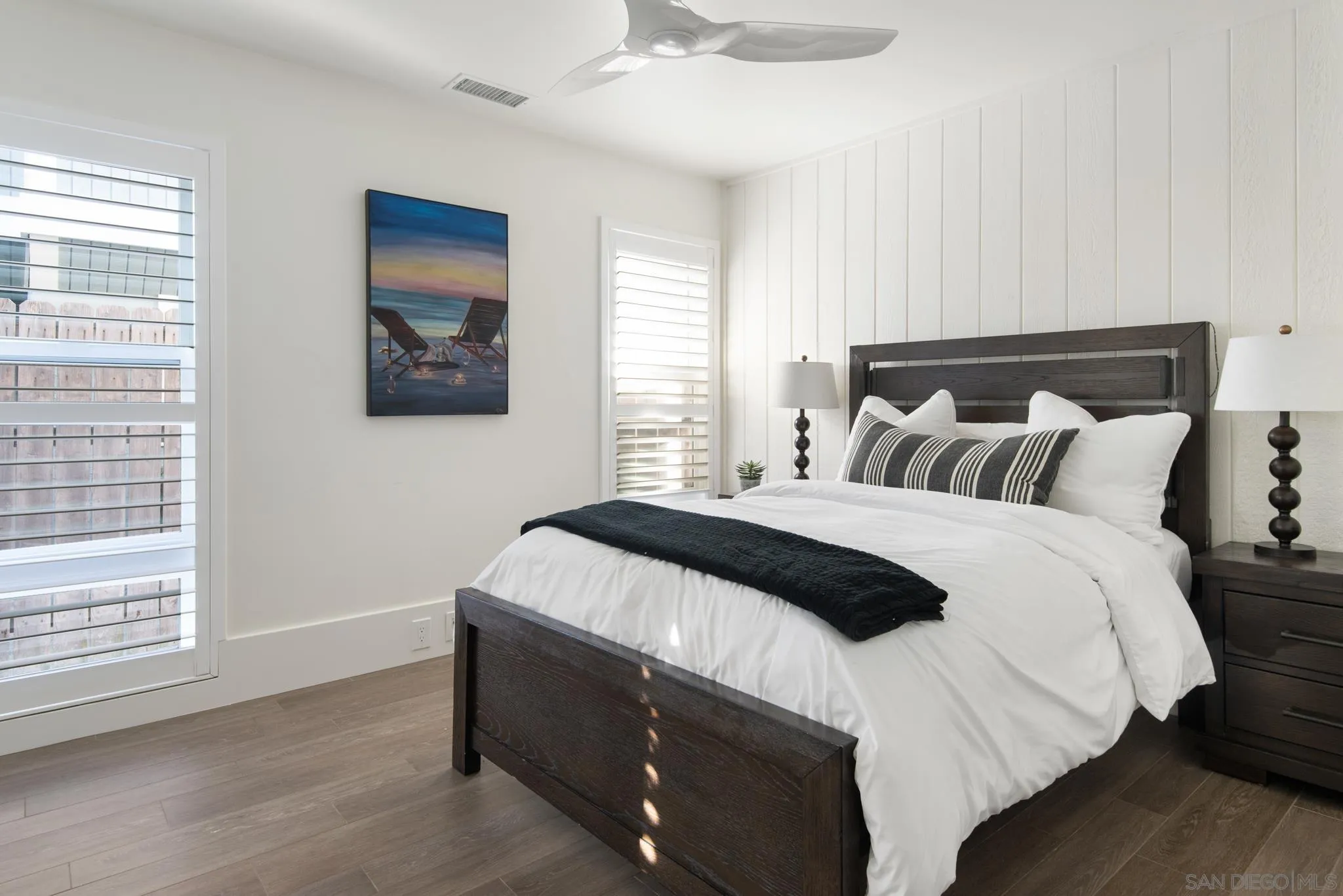 1933 Coast Boulevard Del Mar, CA 92014 - Photo 37 of 47 a bedroom with a bed and a window