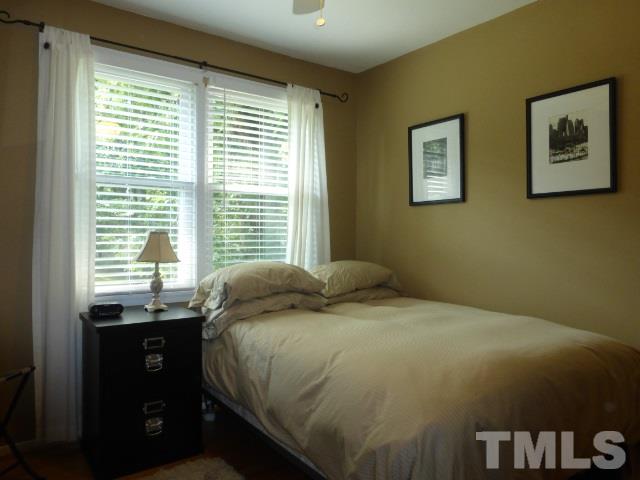 2107 Watkins Street Raleigh, NC 27604 - Photo 12 of 23 Worth repeating - new windows and plantation shutters were added throughout the house in 2012. This is the third bedroom.