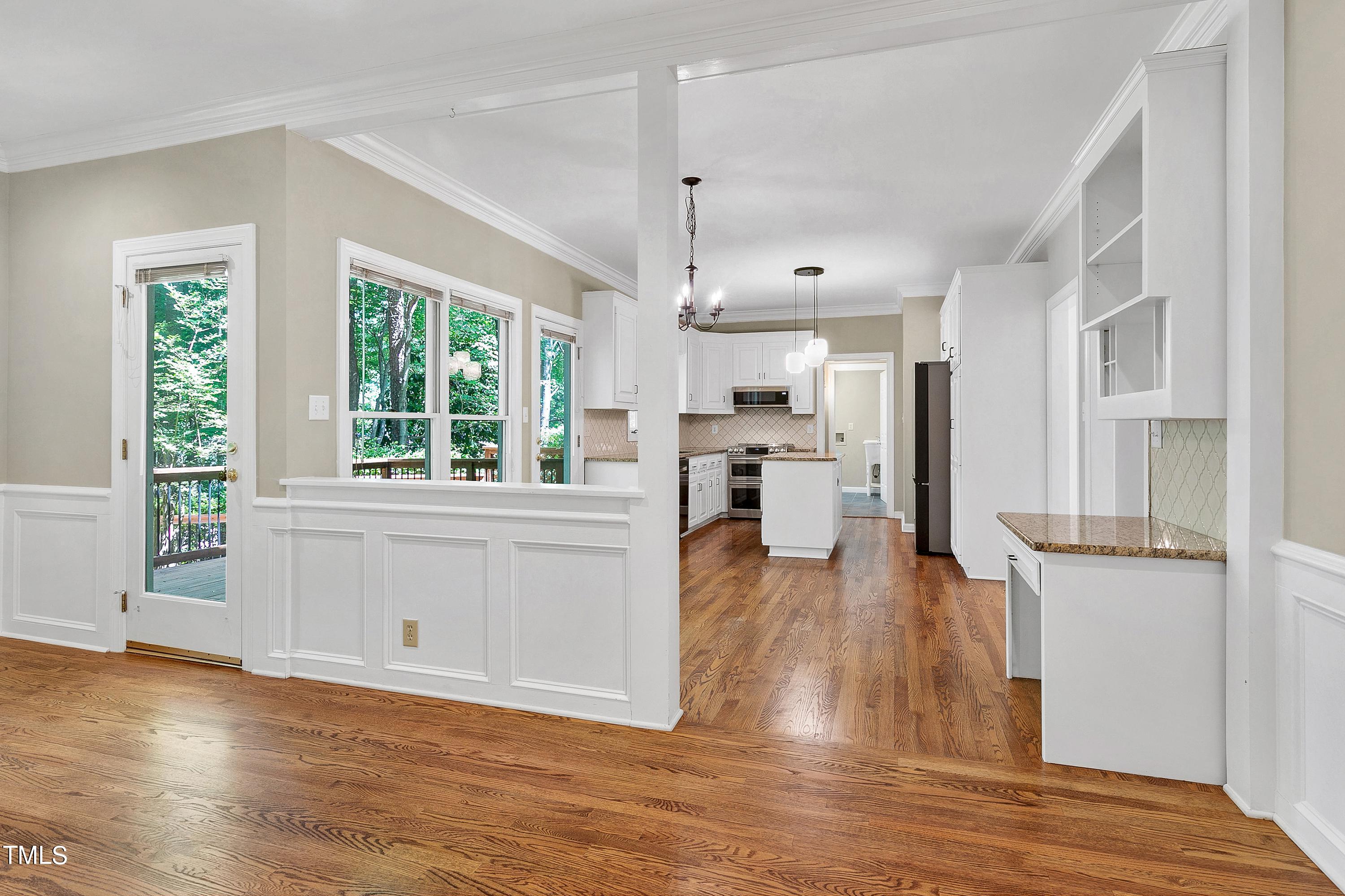100 Buckden Place Cary, NC 27518 - Photo 12 of 70 100 Buckden 11 living room to kitchen