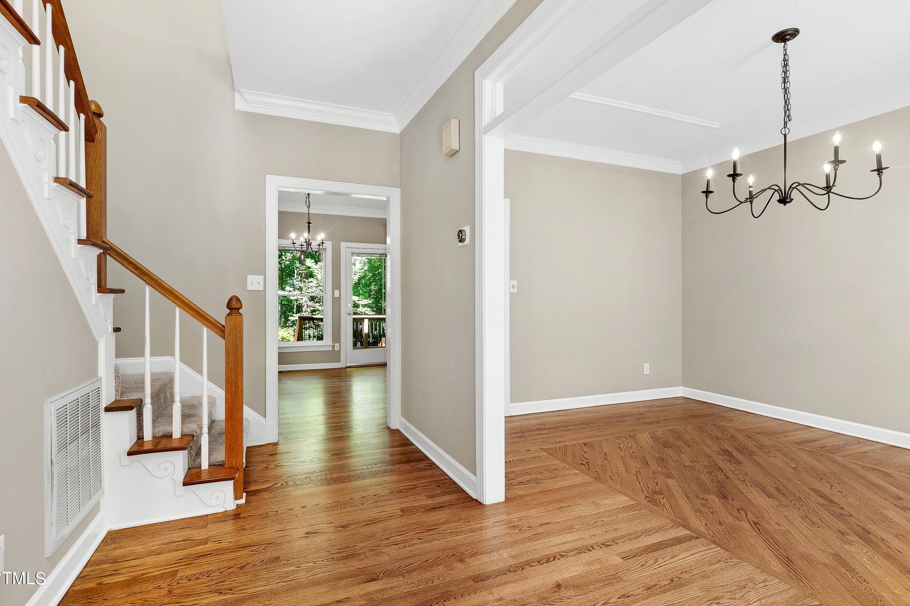 100 Buckden Place Cary, NC 27518 - Photo 3 of 70 a view of an entryway with wooden floor