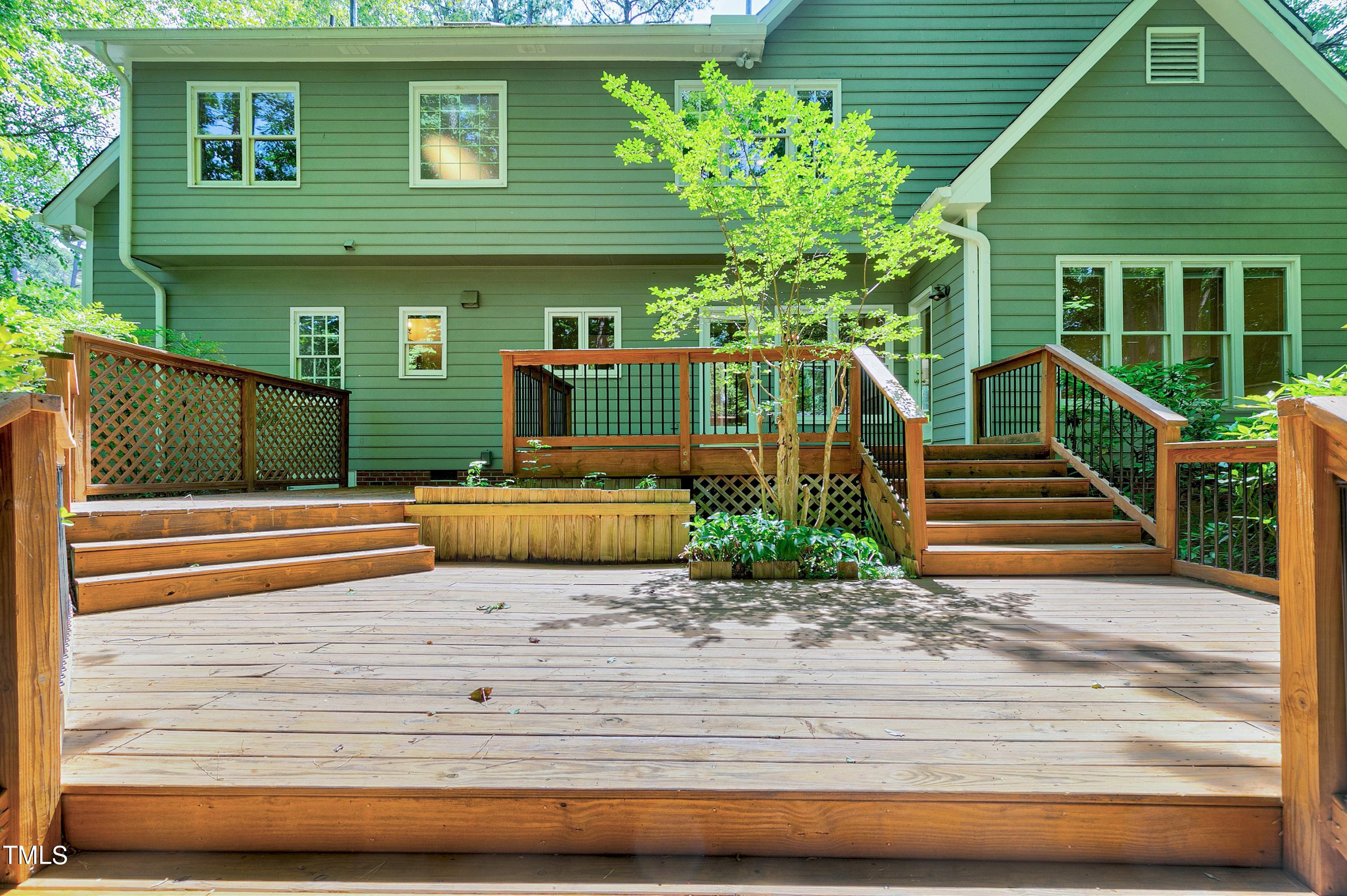 100 Buckden Place Cary, NC 27518 - Photo 43 of 70 a view of a house with a balcony