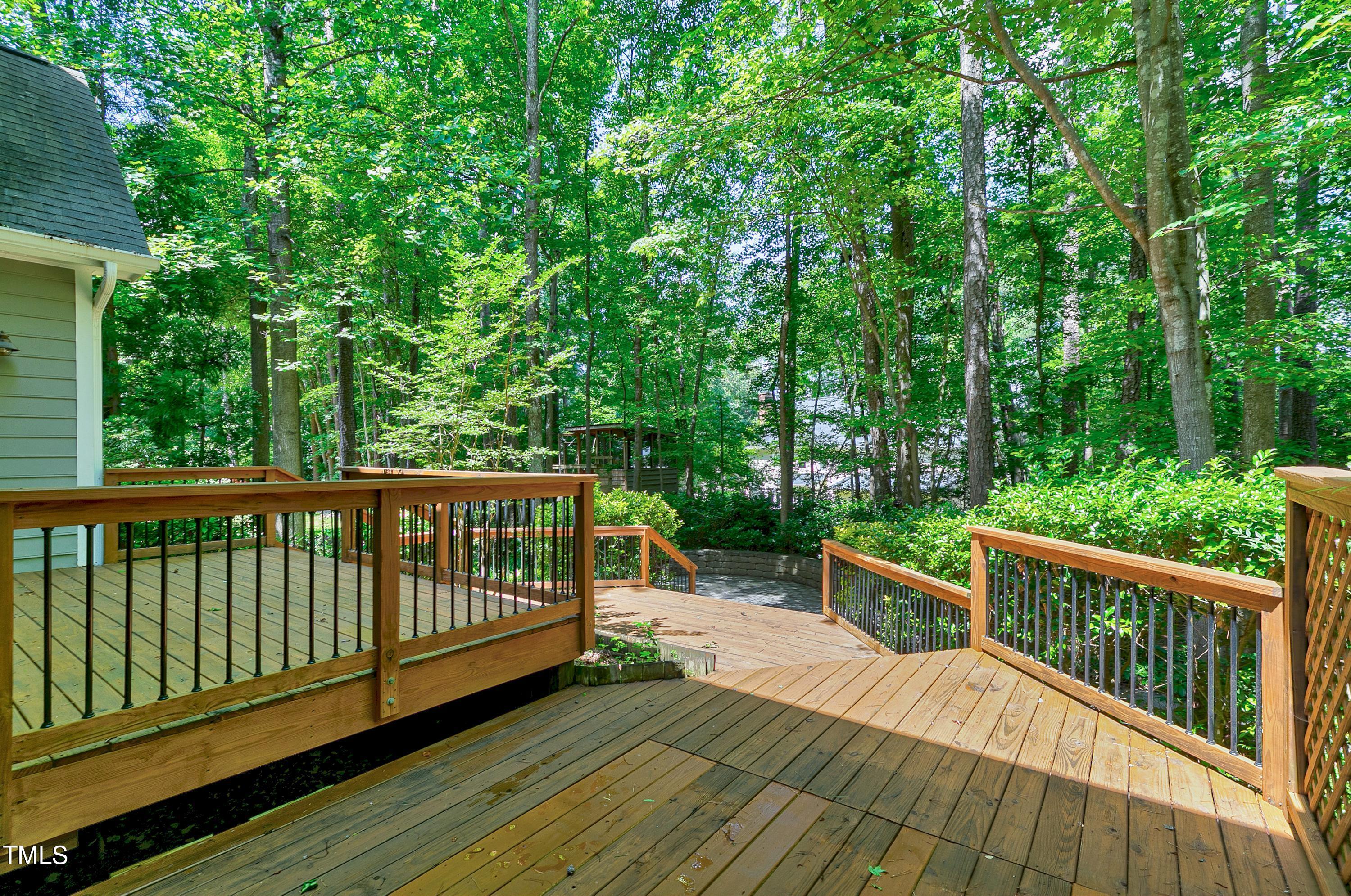 100 Buckden Place Cary, NC 27518 - Photo 45 of 70 a view of deck with a large trees