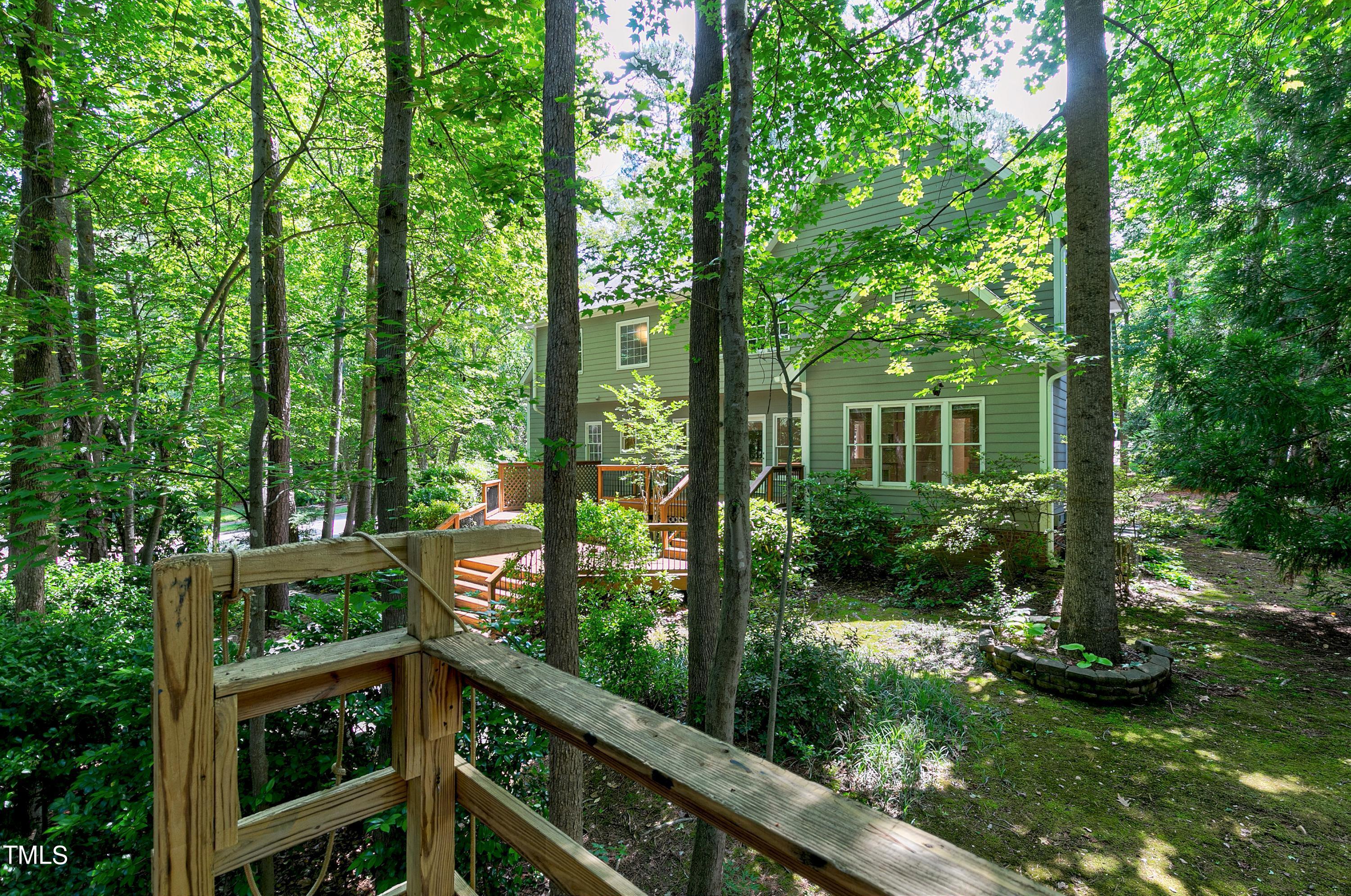 100 Buckden Place Cary, NC 27518 - Photo 55 of 70 a view of a house with backyard from a balcony