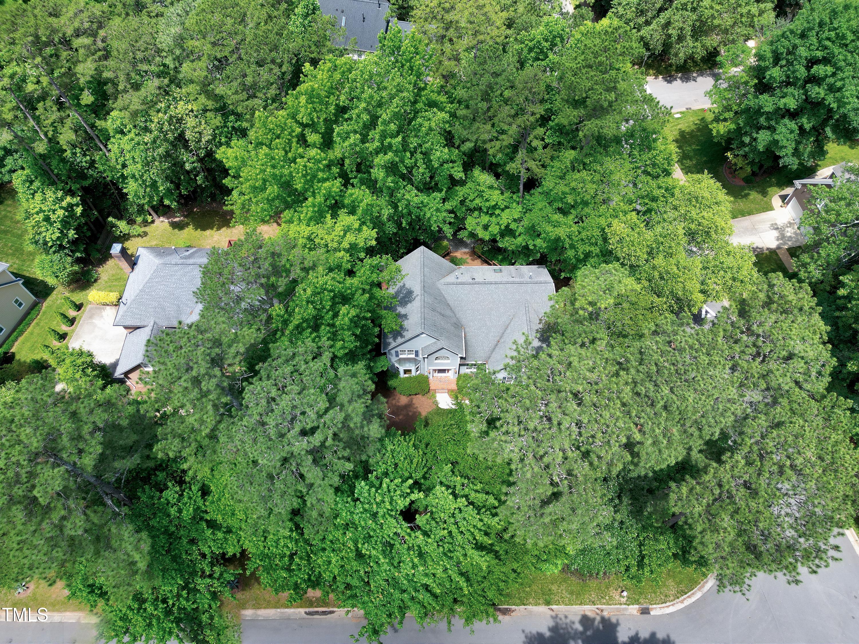 100 Buckden Place Cary, NC 27518 - Photo 61 of 70 an aerial view of a house with a yard and outdoor seating