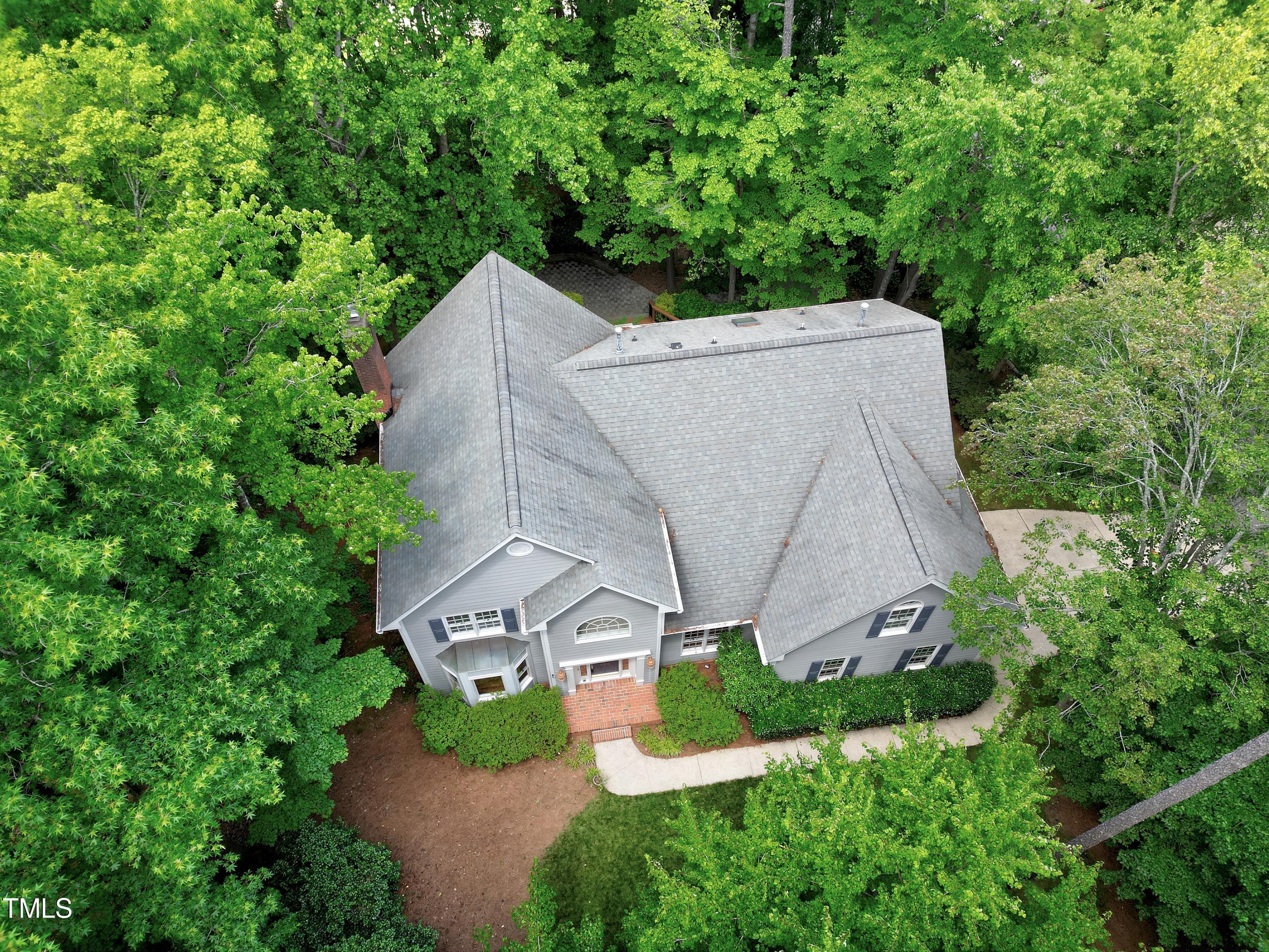 100 Buckden Place Cary, NC 27518 - Photo 62 of 70 an aerial view of a house with yard and outdoor seating