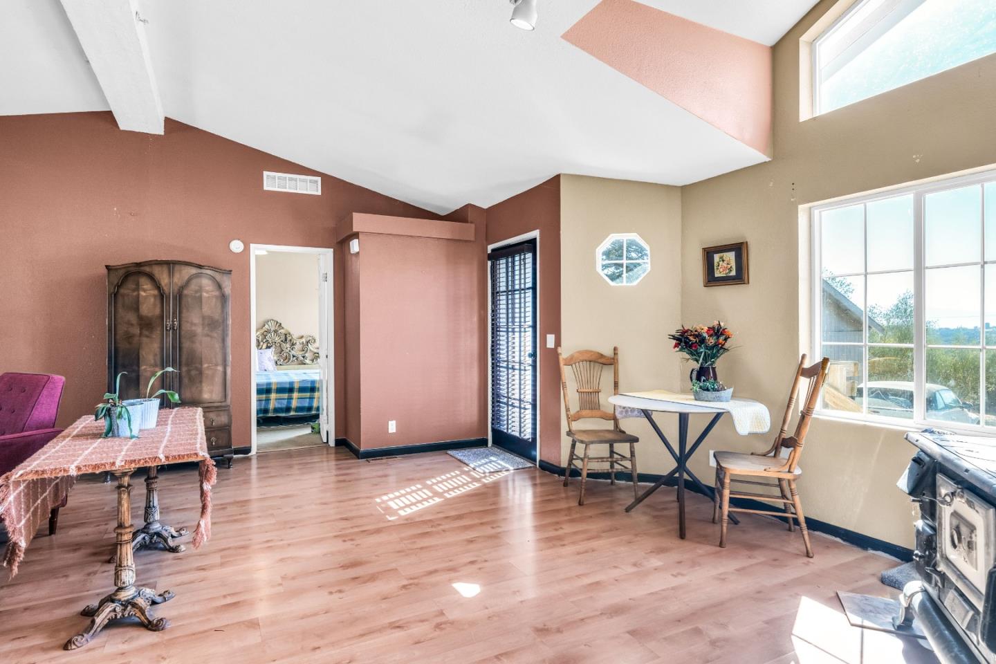 8645 Archer Road Salinas, CA 93907 - Photo 12 of 60 a living room with furniture and wooden floor