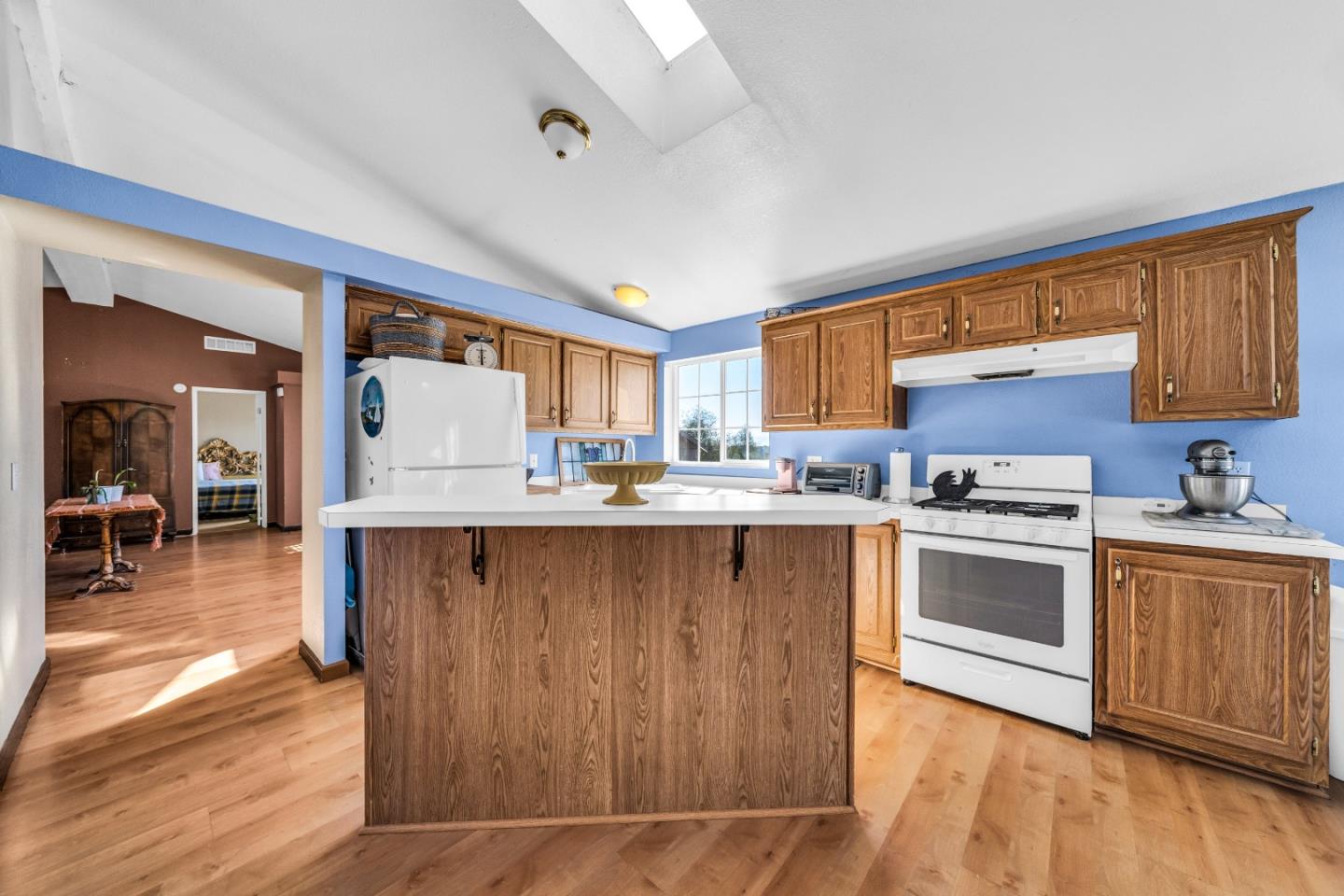 8645 Archer Road Salinas, CA 93907 - Photo 16 of 60 a kitchen with stainless steel appliances granite countertop a stove a sink dishwasher and a refrigerator