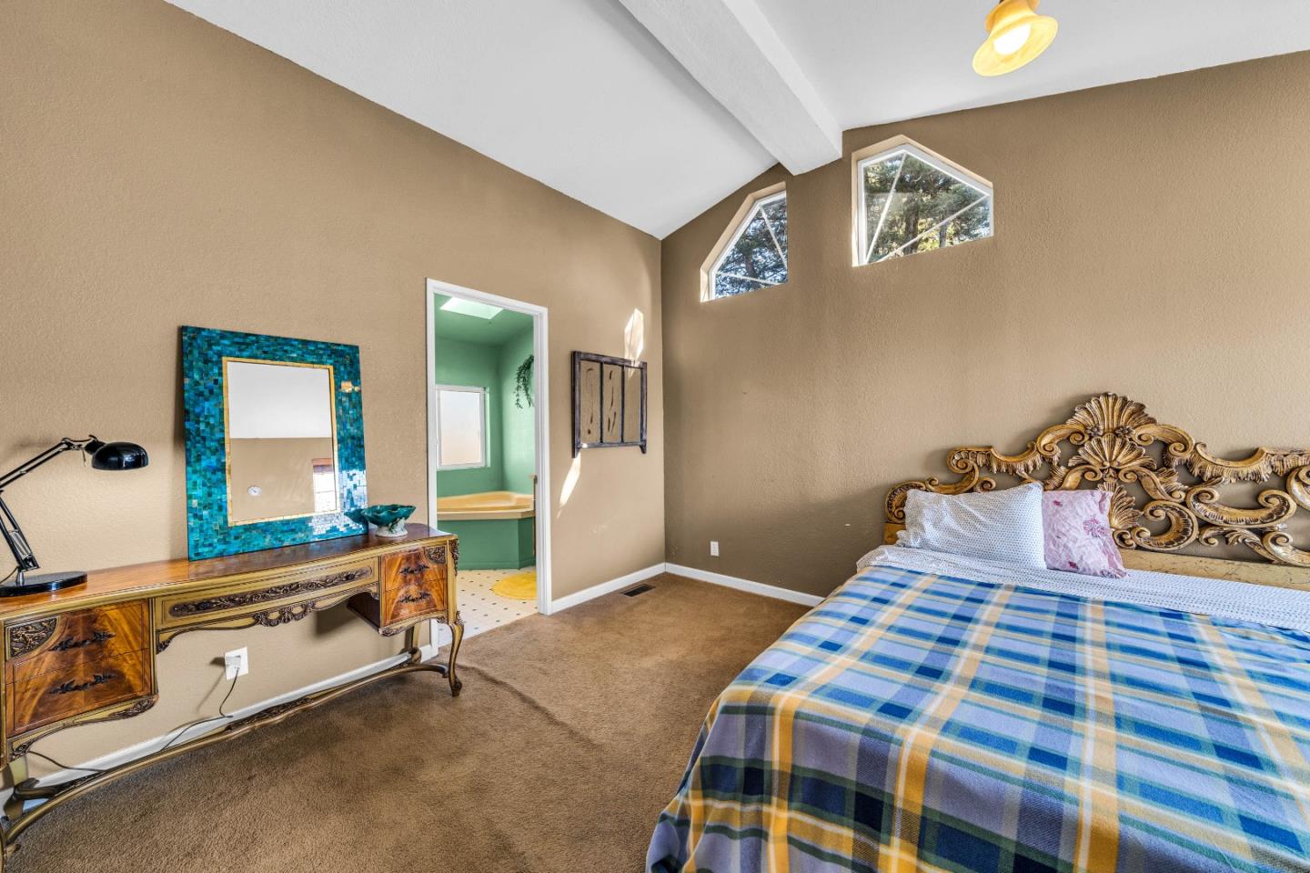 8645 Archer Road Salinas, CA 93907 - Photo 24 of 60 a bedroom with a bed and wooden floor