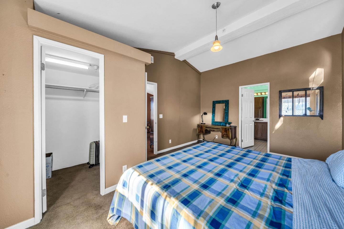 8645 Archer Road Salinas, CA 93907 - Photo 26 of 60 a bedroom with a bed and a dresser