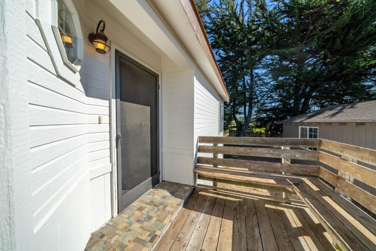 8645 Archer Road Salinas, CA 93907 - Photo 3 of 60 a view of balcony with wooden floor and fence