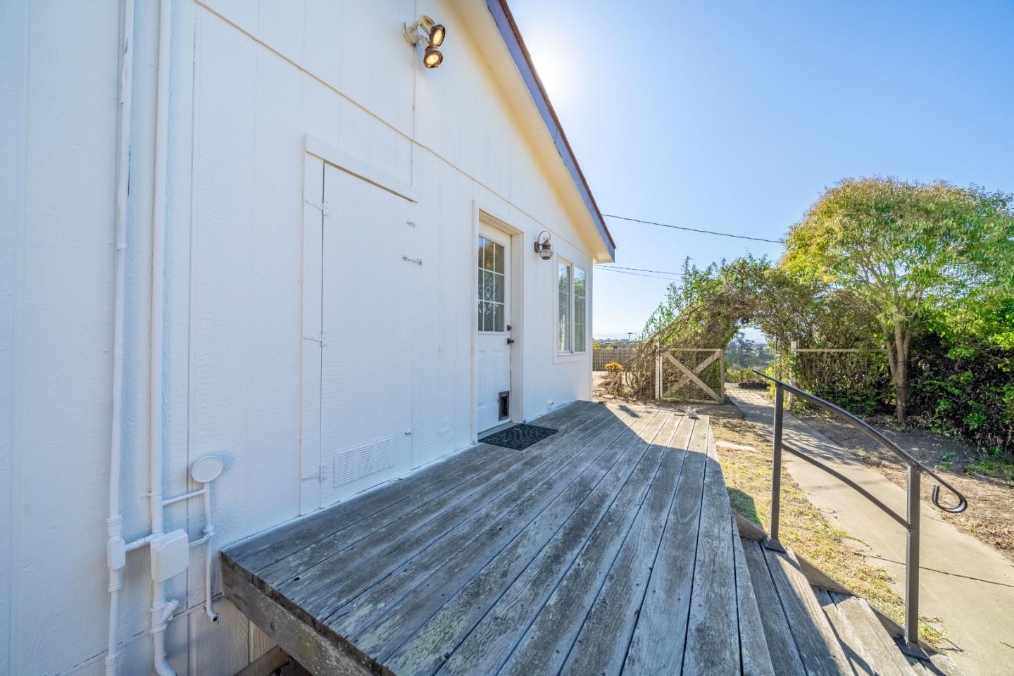 8645 Archer Road Salinas, CA 93907 - Photo 37 of 60 a view of a house with backyard and wooden floor