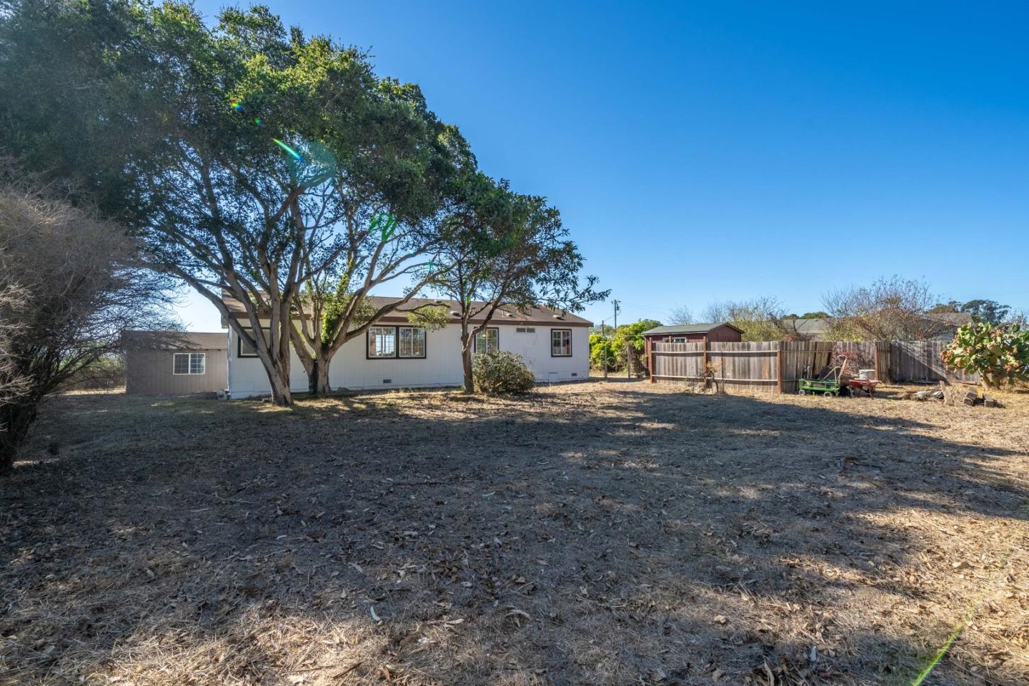 8645 Archer Road Salinas, CA 93907 - Photo 43 of 60 a view of a house with a yard