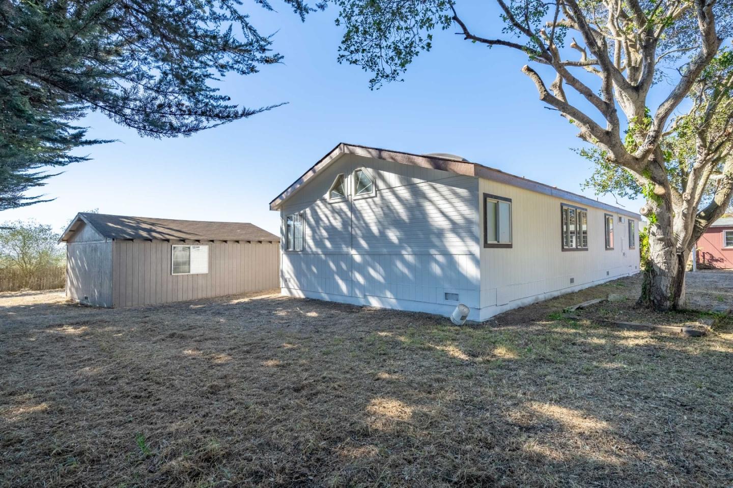 8645 Archer Road Salinas, CA 93907 - Photo 45 of 60 a view of a house with a yard and large tree