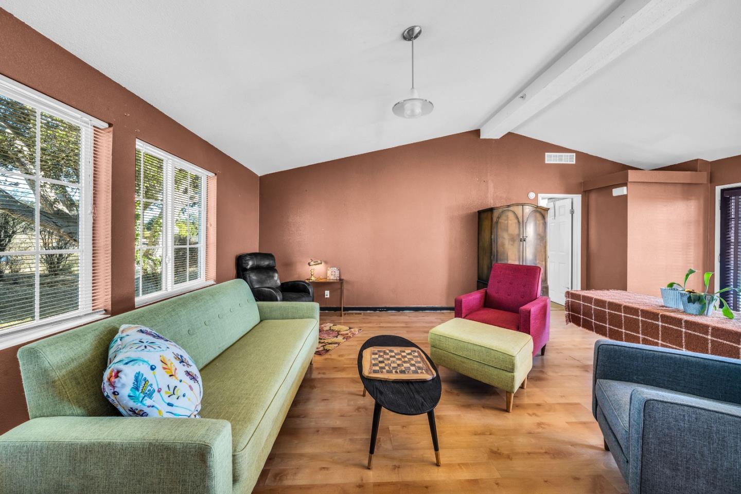 8645 Archer Road Salinas, CA 93907 - Photo 8 of 60 a living room with furniture and floor to ceiling windows