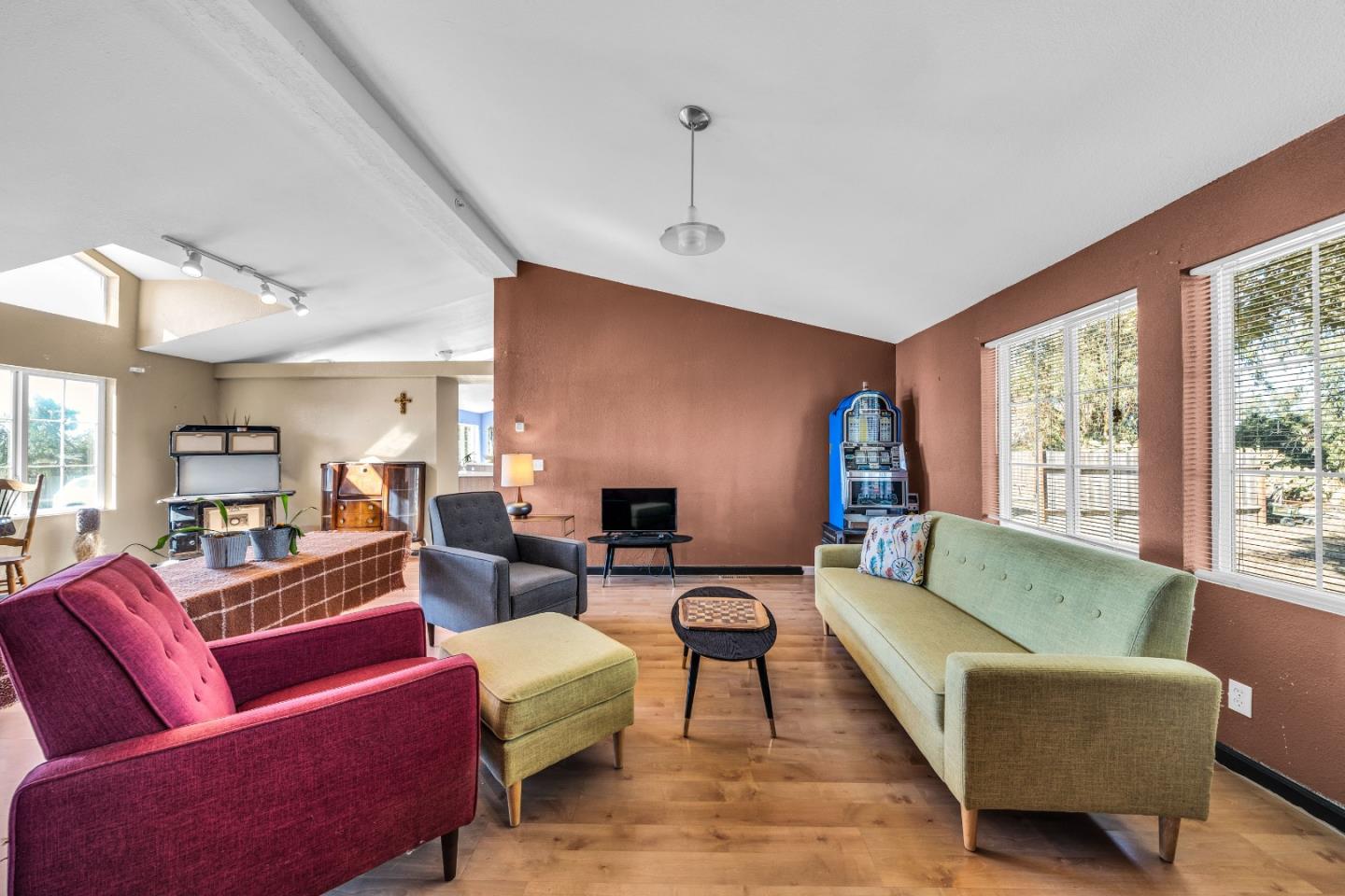 8645 Archer Road Salinas, CA 93907 - Photo 9 of 60 a living room with furniture wooden floor and a large window