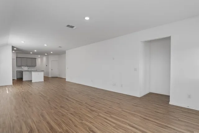 a view of kitchen with wooden floor