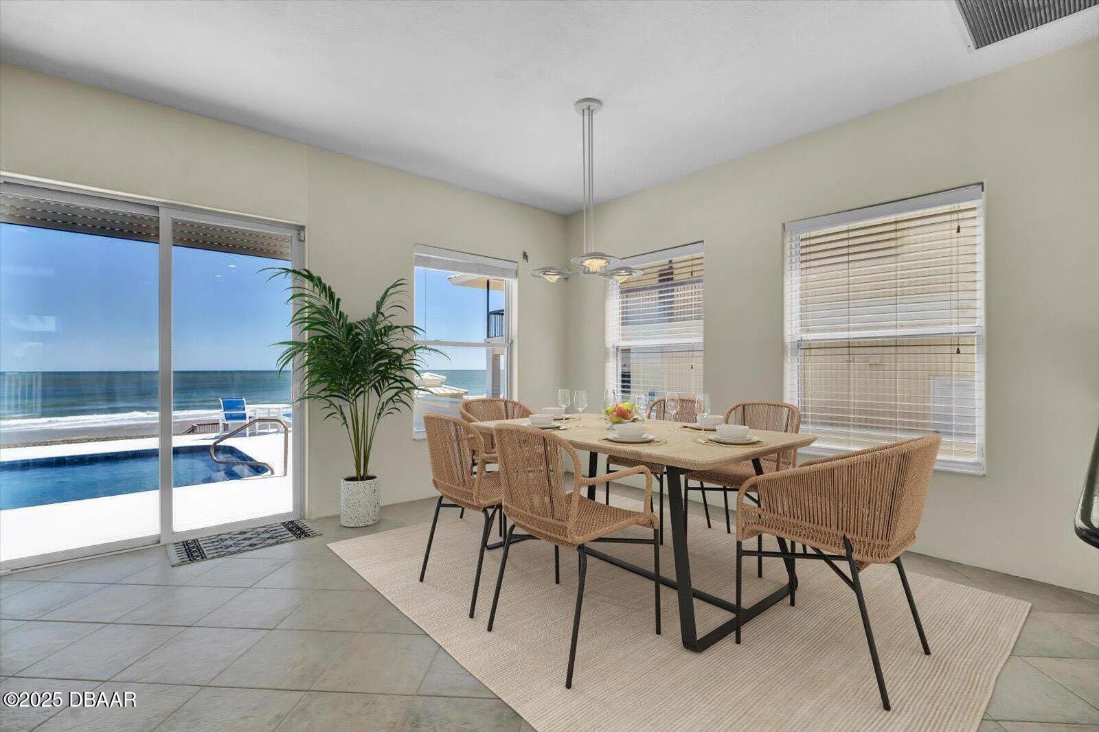 4363 South Atlantic Avenue Ponce Inlet, FL 32127 - Photo 13 of 46 a view of a dining room with furniture and window