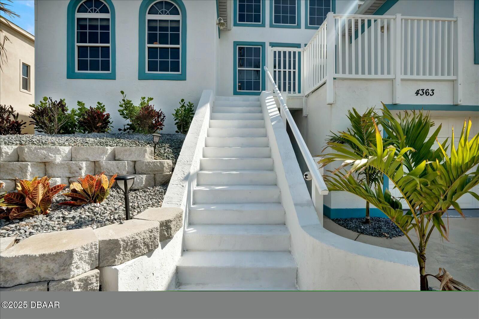 4363 South Atlantic Avenue Ponce Inlet, FL 32127 - Photo 34 of 46 a view of a backyard with chairs