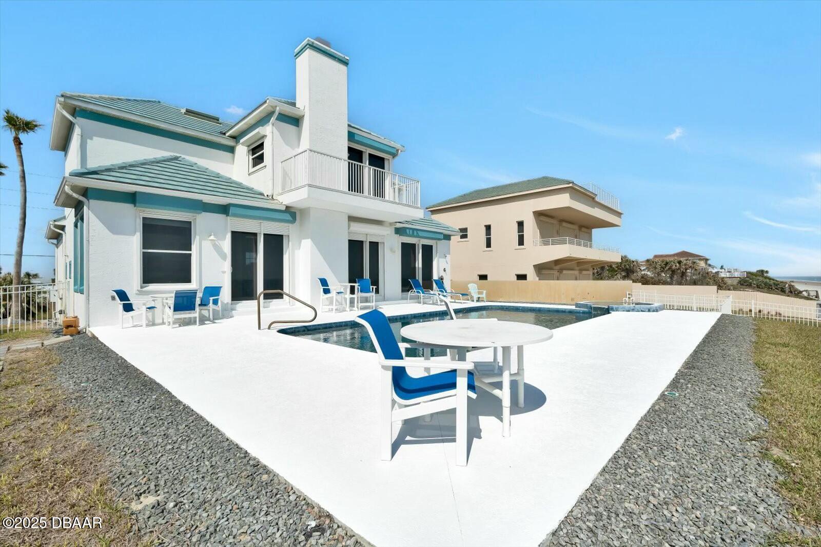 4363 South Atlantic Avenue Ponce Inlet, FL 32127 - Photo 37 of 46 a view of a house with pool table and chairs
