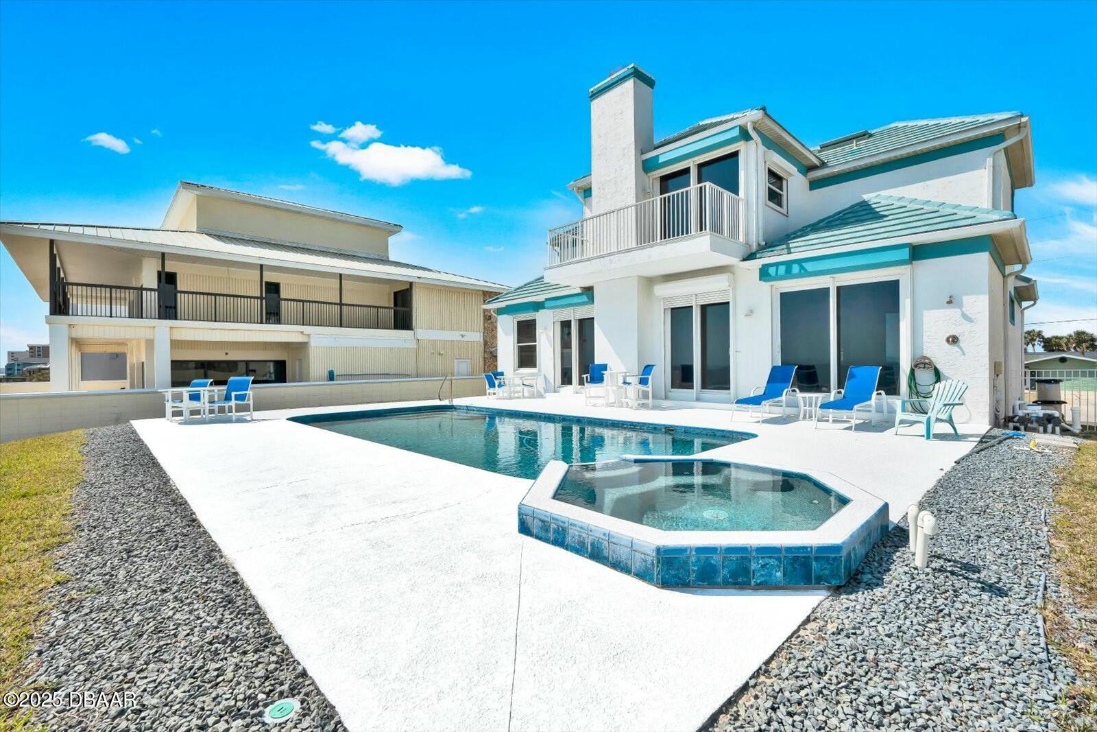 4363 South Atlantic Avenue Ponce Inlet, FL 32127 - Photo 38 of 46 a view of a house with swimming pool