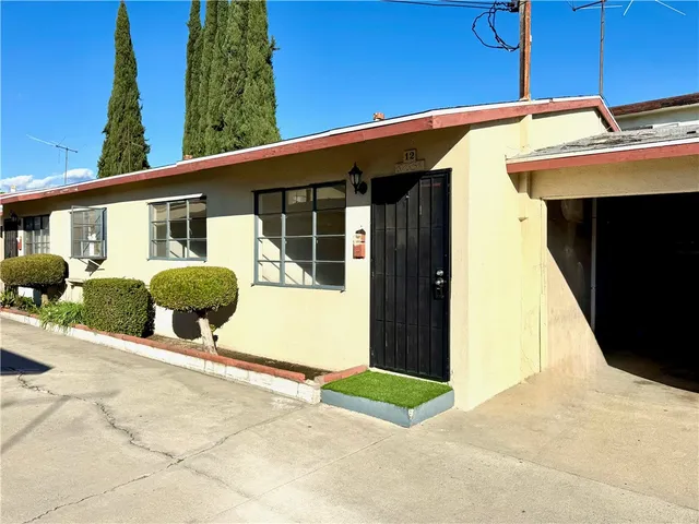 a view of a backyard with a patio