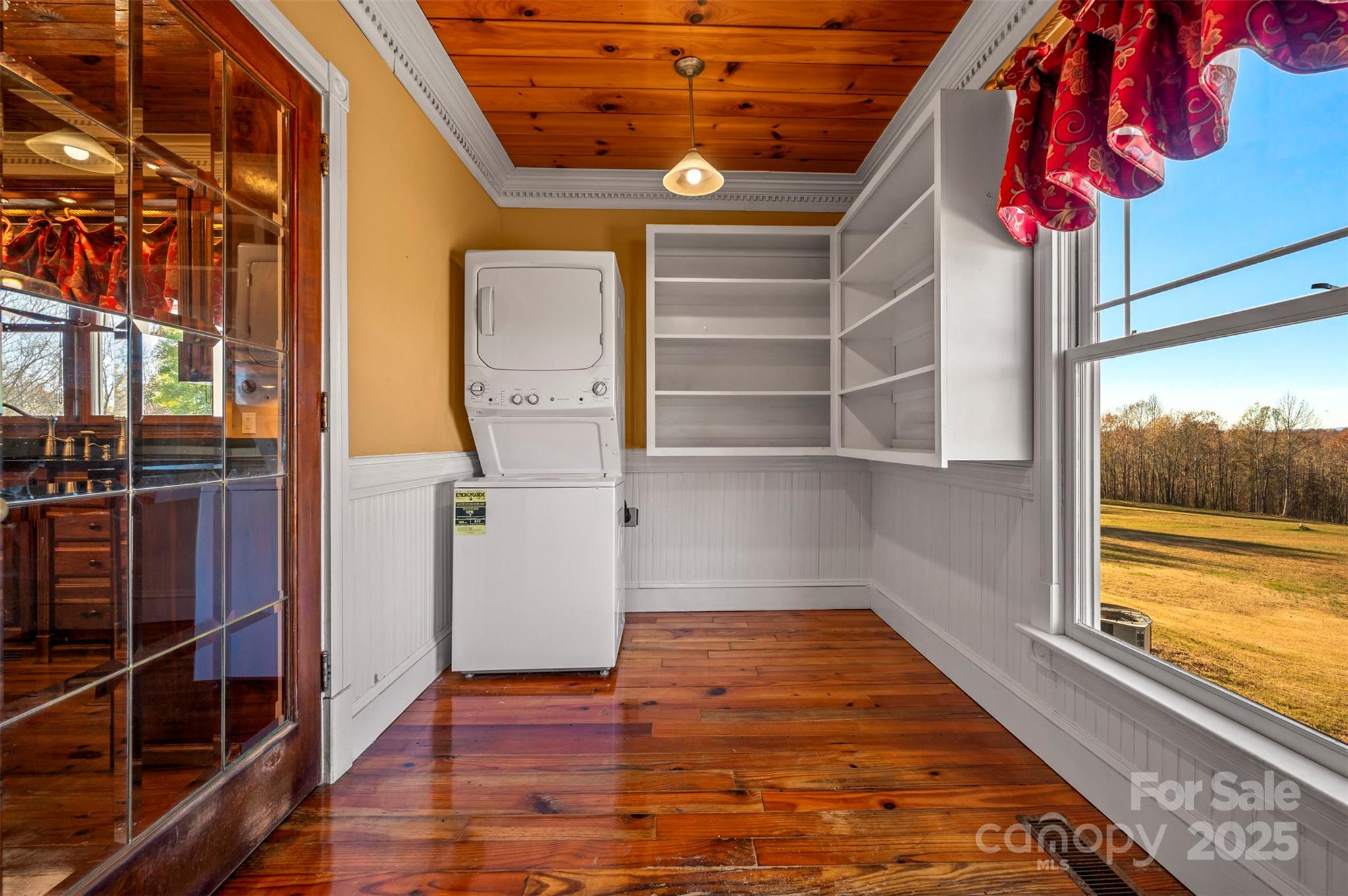648 Harrill Dairy Road Forest City, NC 28043 - Photo 22 of 47 a view of a room with wooden floor and windows