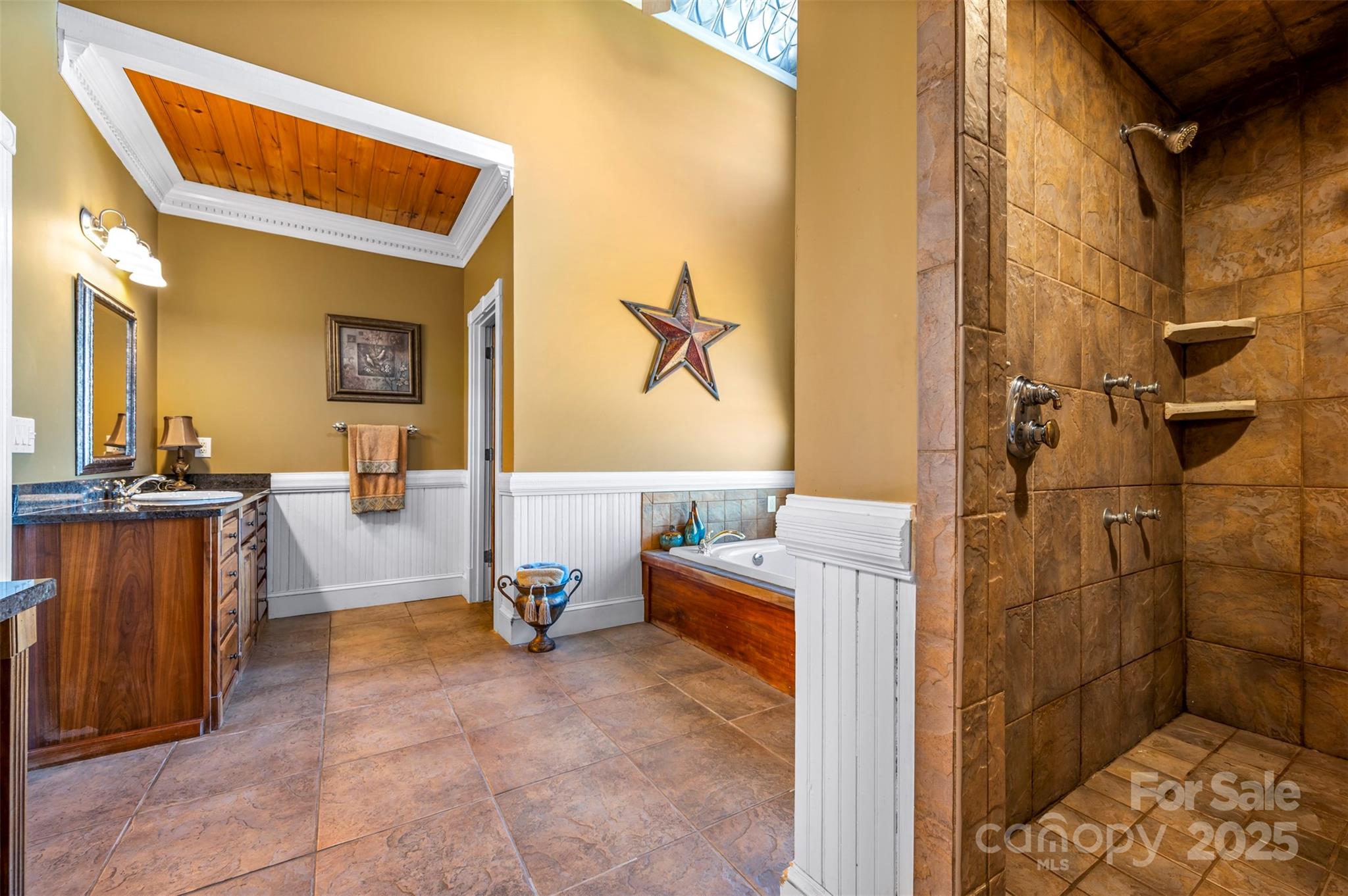648 Harrill Dairy Road Forest City, NC 28043 - Photo 33 of 47 a bathroom with a tub sink and mirror