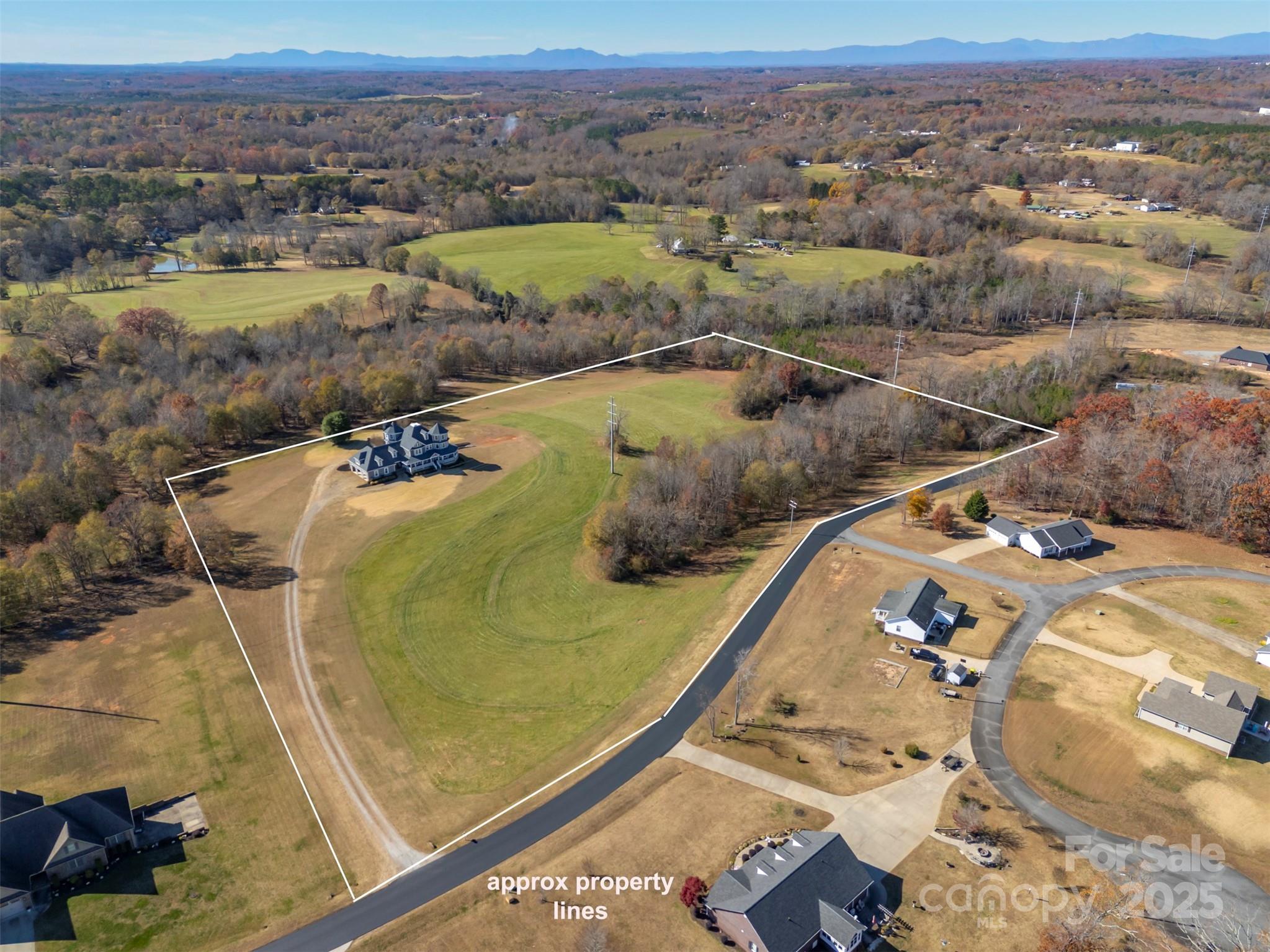 648 Harrill Dairy Road Forest City, NC 28043 - Photo 45 of 47 a view of a swimming pool with a mountain