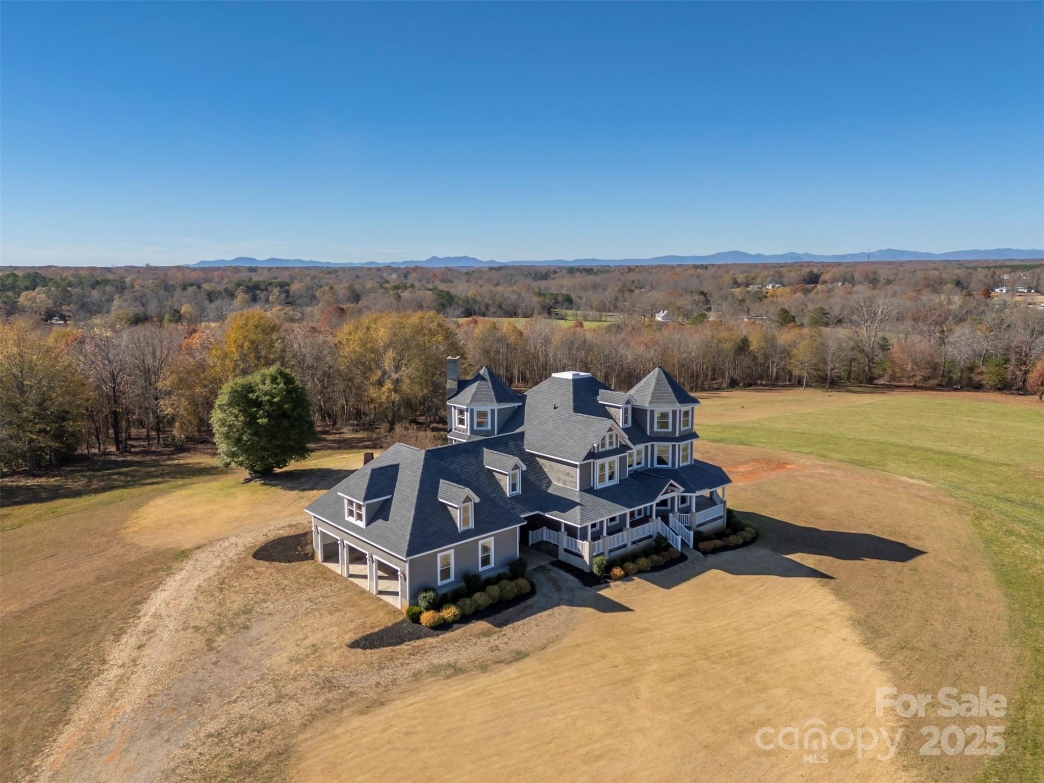 648 Harrill Dairy Road Forest City, NC 28043 - Photo 5 of 47 a view of a terrace with a table and chairs