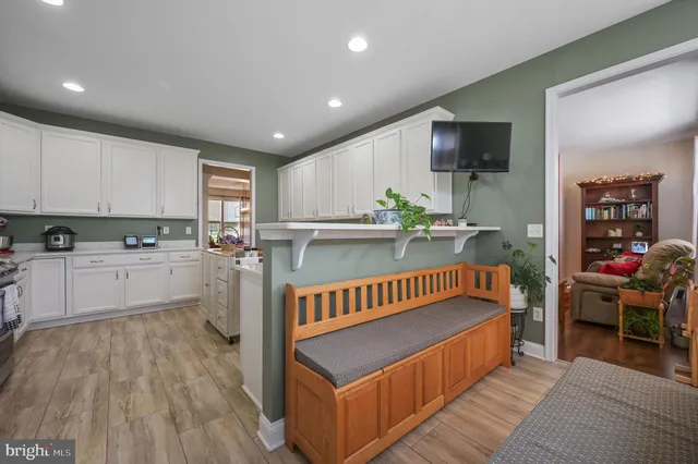 a kitchen with sink cabinets and window