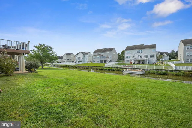 a view of a garden with houses